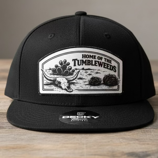 Black Snapback with a Full Color Patch with the text "Home of the Tumbleweeds" with a cactus, tumbleweeds, longhorn skull, cactus.
