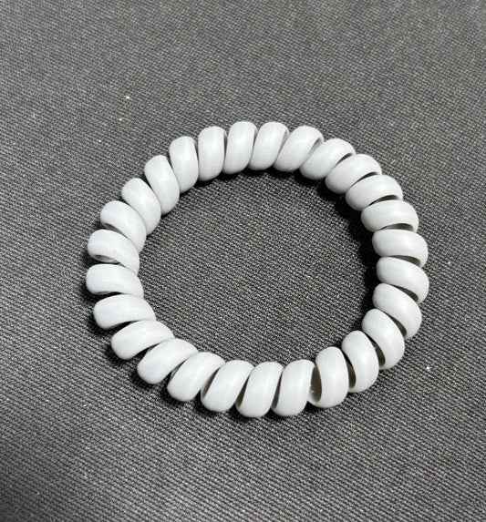 Wolf & Sparrow “Coiled” Hair Tie