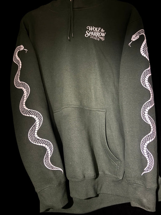 Wolf & Sparrow Studio “Medusa Girl” Hoodie front and snake sleeves in Sport Green